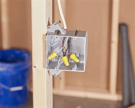 attaching electrical outlet box to metal framing|how to attach electrical boxes.